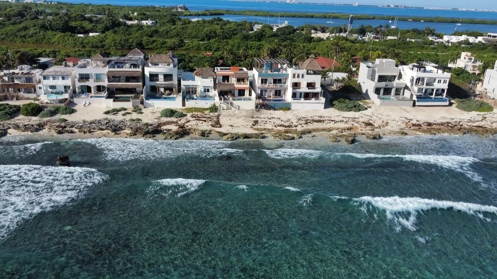 Aerial view of the beachfront at Rincón del Descanso on Isla Mujeres