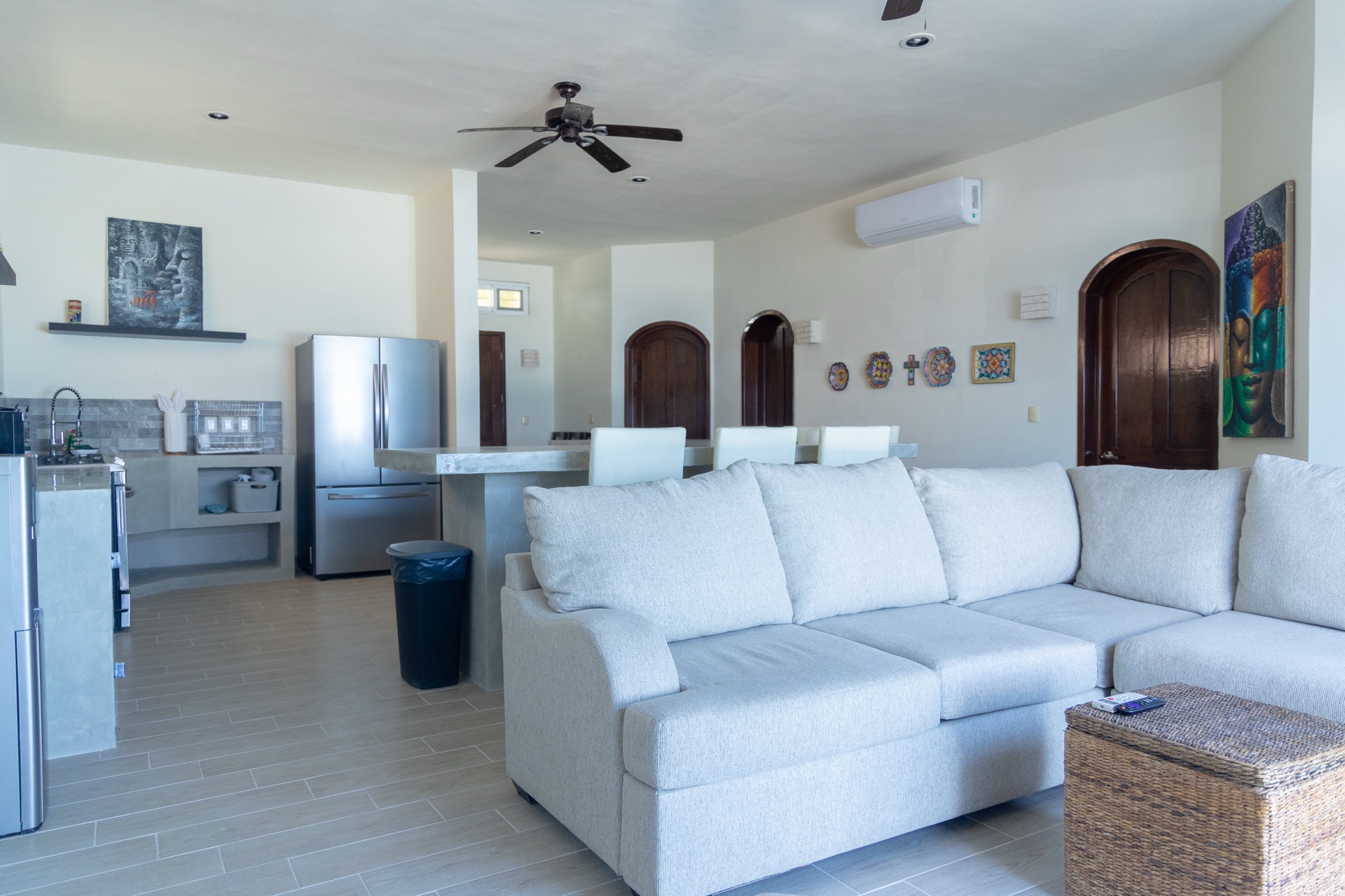 Living room with kitchen visible in background Isla Mujeres vacation home