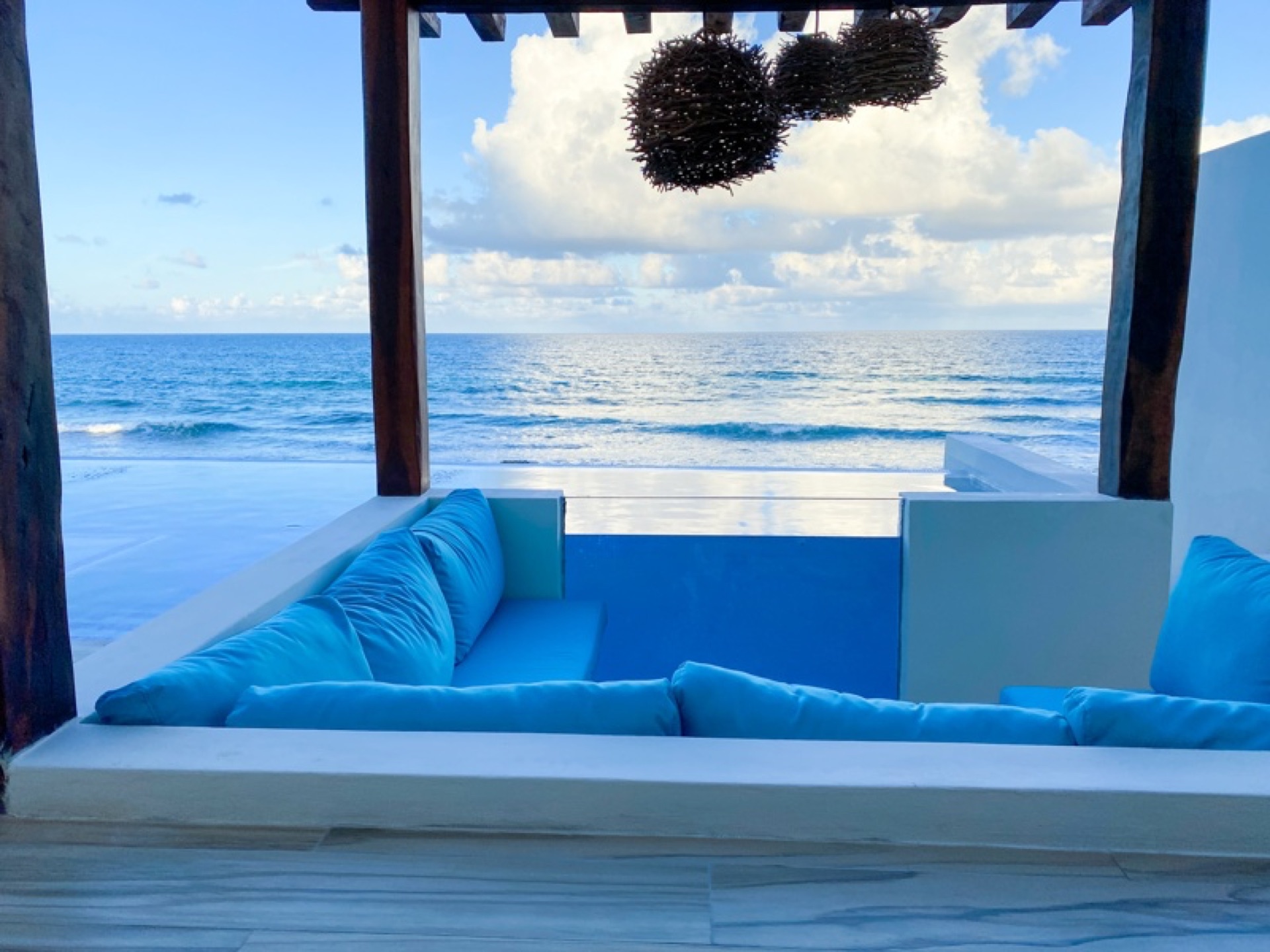 Sunset over the rooftop pergola Isla Mujeres vacation rental