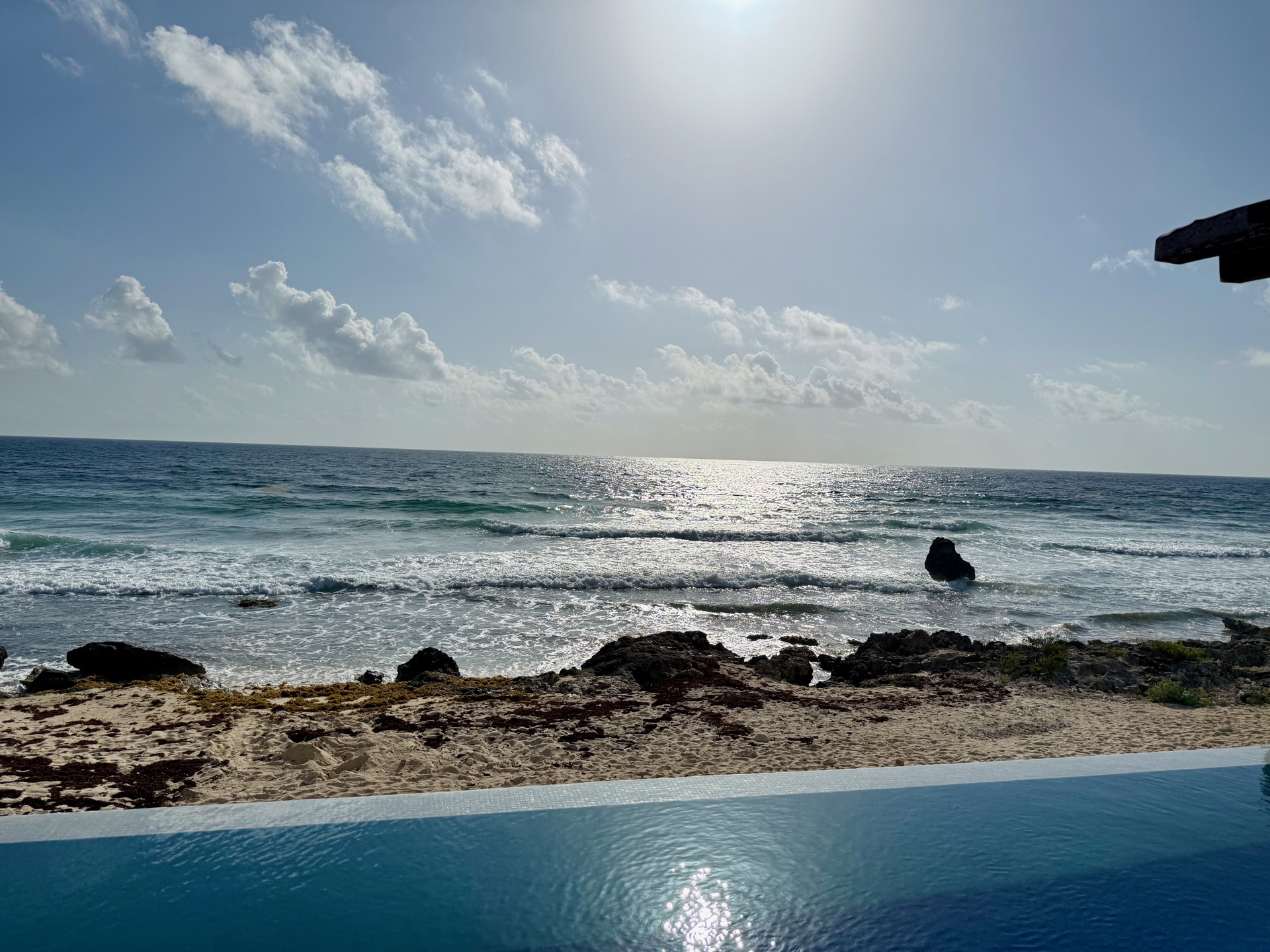 Infinity pool and Caribbean horizon on a clear day Isla Mujeres